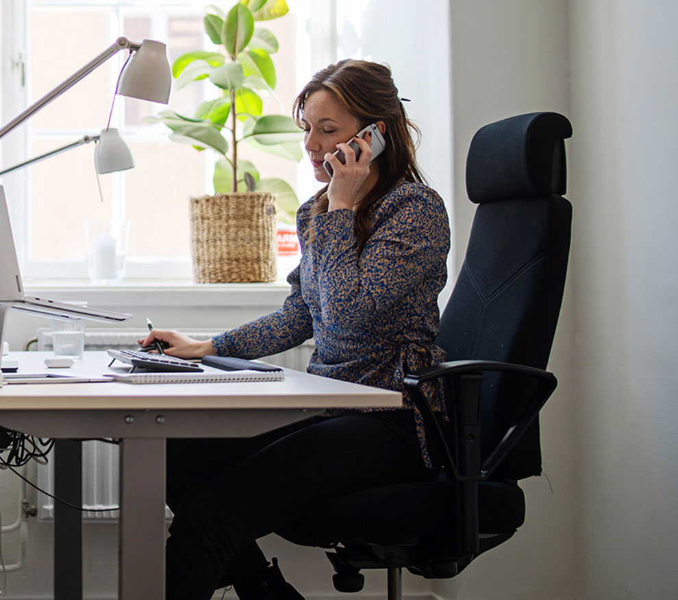 Sales women by desk