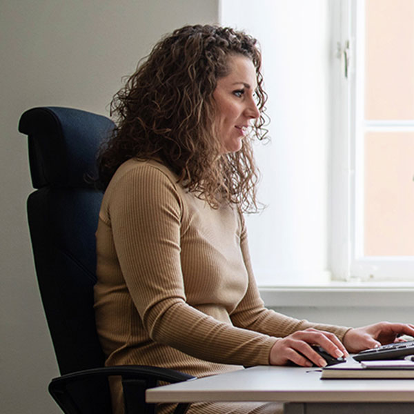 Sales women by desk